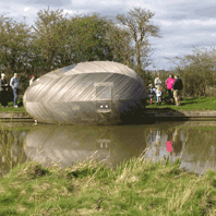 Visitors wait to visit Stephen Turner in the Exbury Egg, Milton Keynes, April 2017